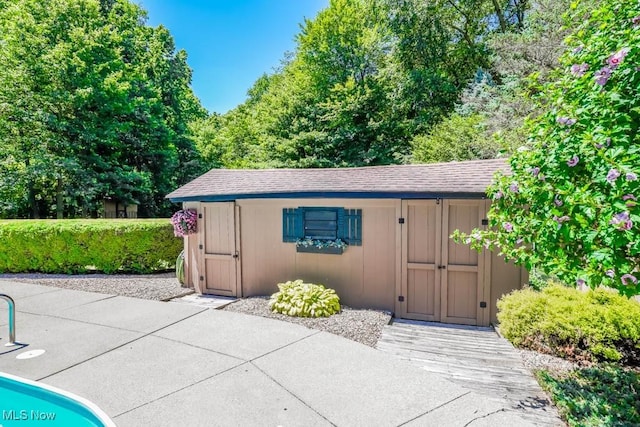 view of outbuilding with an outbuilding