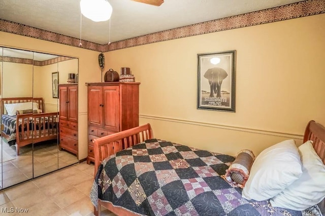 bedroom with light tile patterned floors