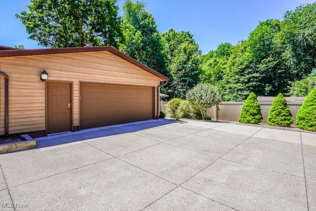 garage with fence