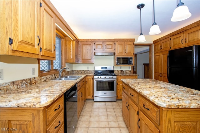 kitchen featuring a sink, light stone countertops, black appliances, and under cabinet range hood