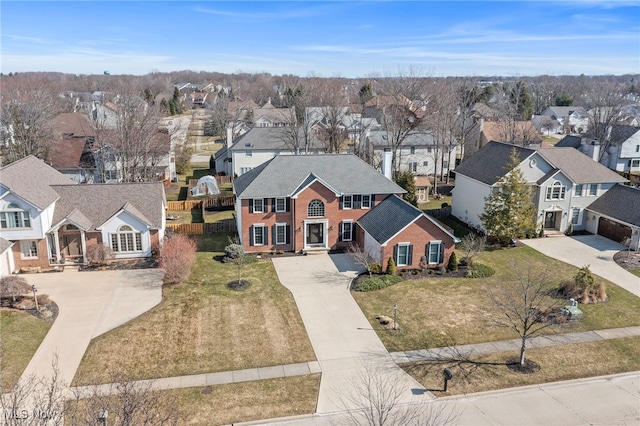 birds eye view of property with a residential view