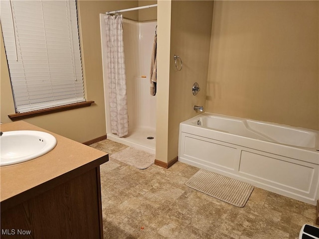 full bath featuring curtained shower, baseboards, a bathtub, and vanity