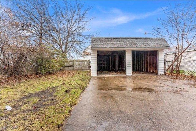 detached garage with fence