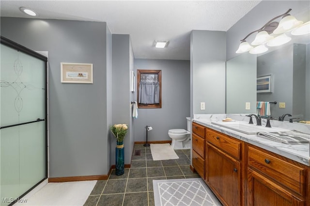 full bath with baseboards, toilet, vanity, and tile patterned flooring