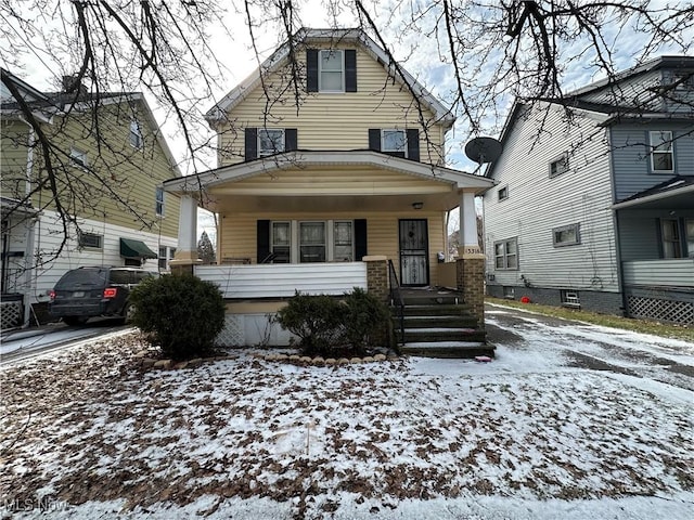 view of front of house featuring covered porch and central AC