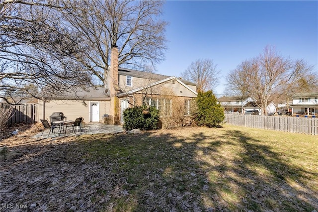 view of yard featuring a patio and fence