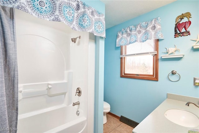 bathroom featuring tile patterned floors, visible vents, toilet, shower / bathing tub combination, and vanity