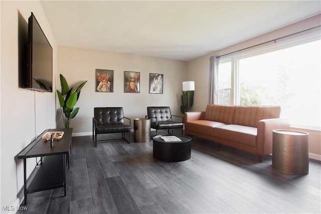 2448 Warrensville Center Rd, University Heights, OH 44118 - living room featuring dark wood-style floors and baseboards