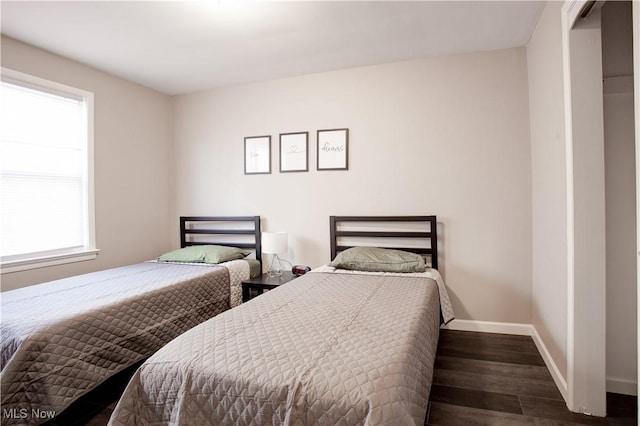 2448 Warrensville Center Rd, University Heights, OH 44118 - bedroom with baseboards and wood finished floors