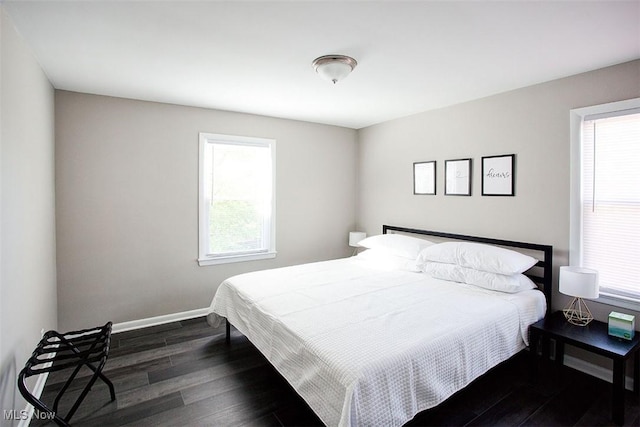 2448 Warrensville Center Rd, University Heights, OH 44118 - bedroom featuring dark wood-style floors and baseboards