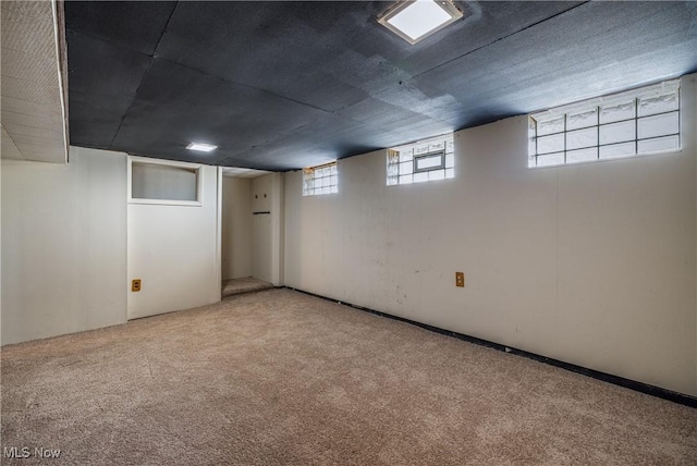 basement with carpet flooring