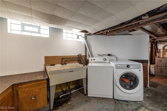 laundry room with laundry area and separate washer and dryer