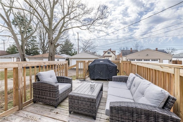 wooden terrace featuring area for grilling, outdoor lounge area, an outdoor structure, and fence