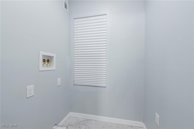 laundry area featuring visible vents, baseboards, laundry area, hookup for a washing machine, and marble finish floor