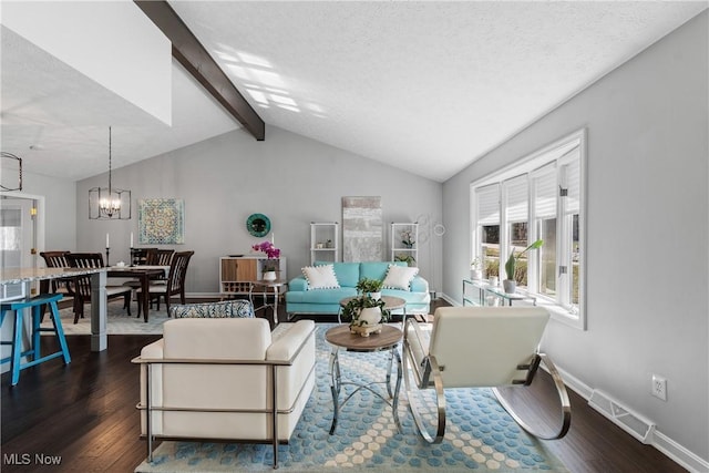 living room with dark wood finished floors, visible vents, a textured ceiling, and lofted ceiling with beams