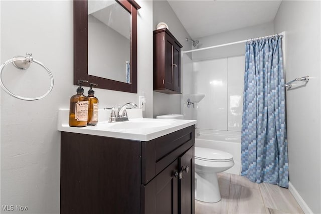 bathroom featuring vanity, toilet, and shower / bathtub combination with curtain