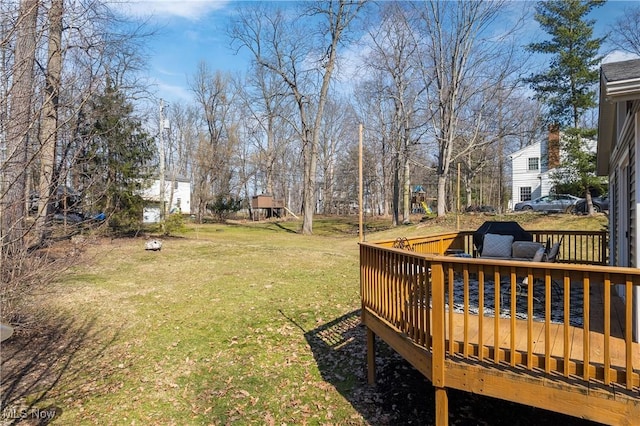 view of yard featuring a deck