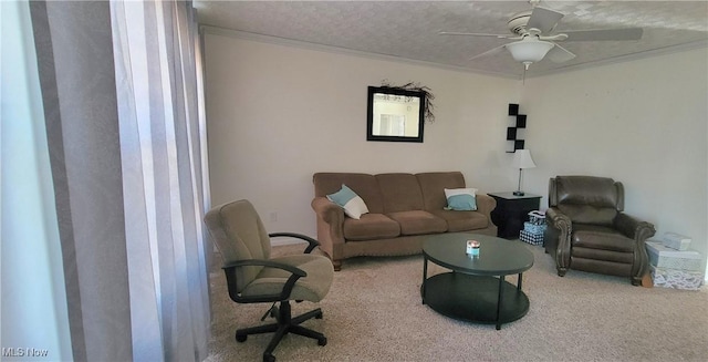 carpeted living room with crown molding, a ceiling fan, and a textured ceiling