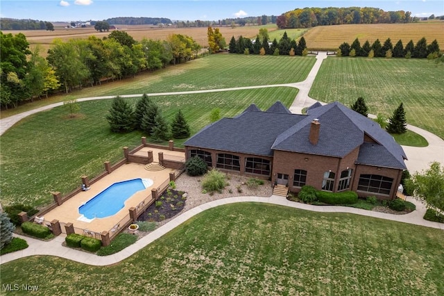 birds eye view of property featuring a rural view