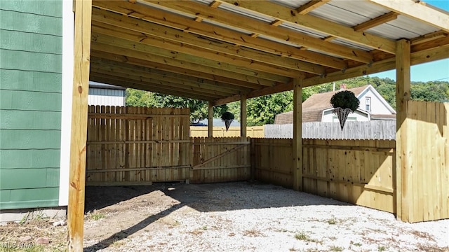 view of patio featuring fence