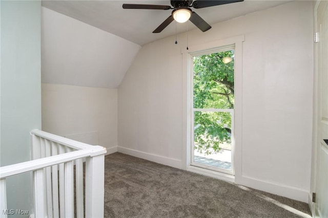 1640 Main St, Stockport, OH 43787 - additional living space with carpet flooring, vaulted ceiling, a ceiling fan, and baseboards