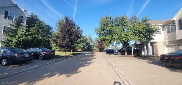 view of road featuring sidewalks and curbs