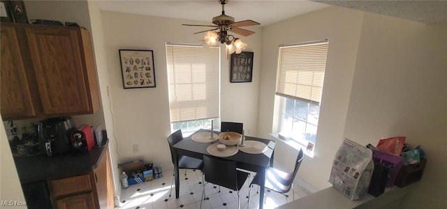 dining space with ceiling fan