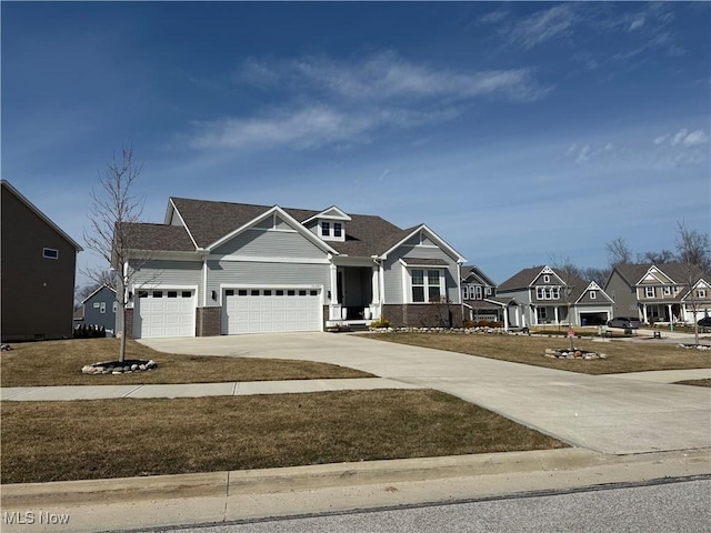 view of front of home featuring brick siding, a residential view, an attached garage, and concrete driveway