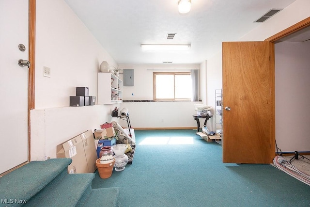 miscellaneous room featuring electric panel, baseboards, visible vents, and carpet floors