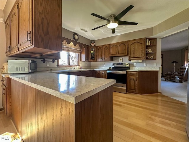 kitchen with open shelves, stainless steel electric stove, a peninsula, light countertops, and ceiling fan