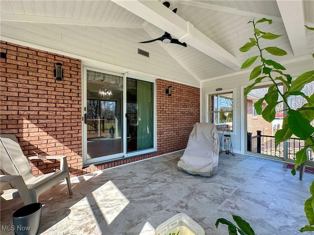 view of patio with visible vents and ceiling fan