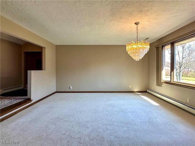 unfurnished room featuring a baseboard heating unit, baseboards, carpet floors, an inviting chandelier, and a baseboard radiator