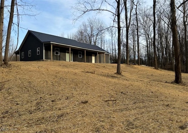 view of front of home featuring metal roof