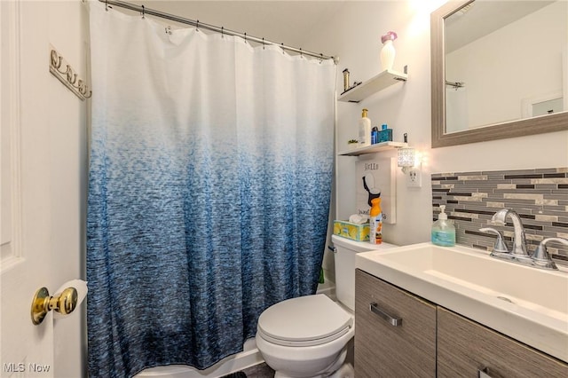 bathroom featuring decorative backsplash, toilet, vanity, and a shower with curtain