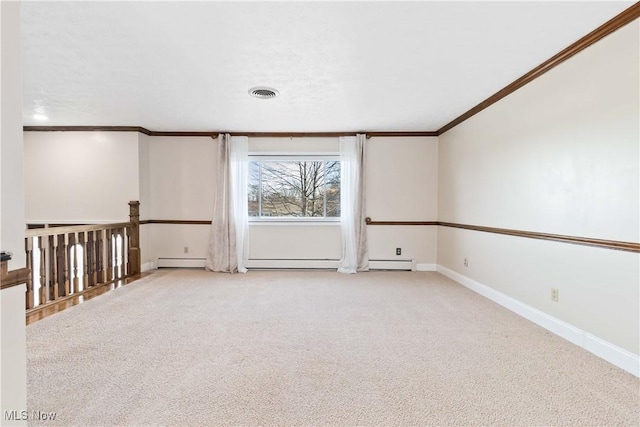 carpeted empty room featuring visible vents, baseboard heating, baseboards, and ornamental molding