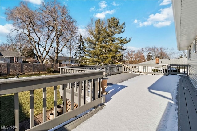 wooden terrace featuring a residential view