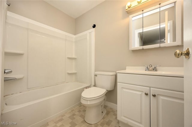 bathroom featuring vanity, toilet, baseboards, and shower / bathtub combination