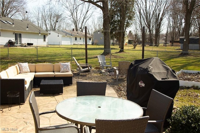 view of patio with outdoor lounge area, outdoor dining area, and fence