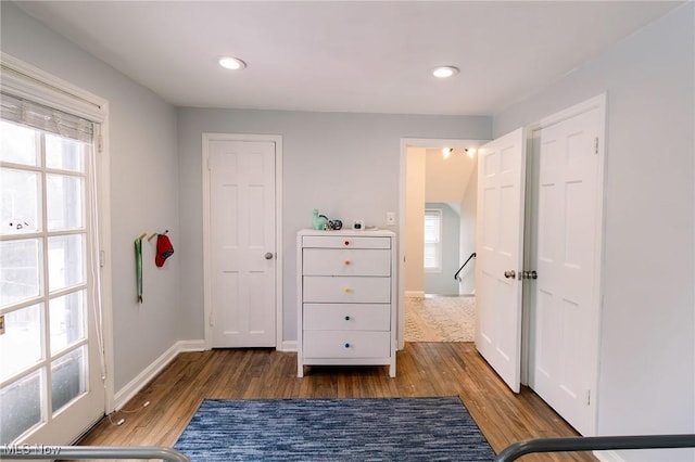 bedroom featuring recessed lighting, baseboards, and wood finished floors