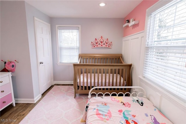 bedroom with recessed lighting and baseboards