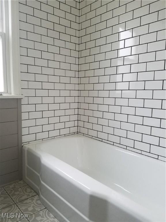 bathroom featuring tile patterned flooring