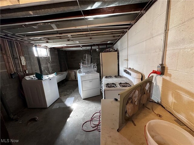 below grade area featuring washer and dryer