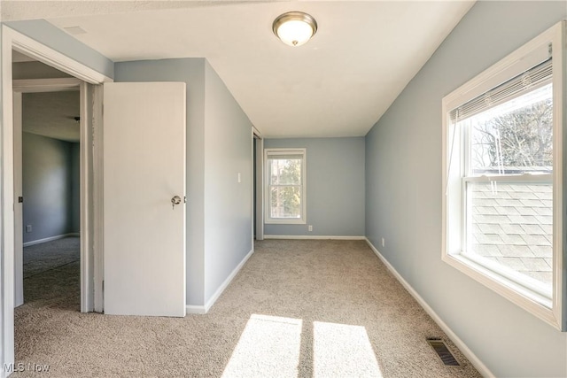 interior space featuring visible vents and baseboards