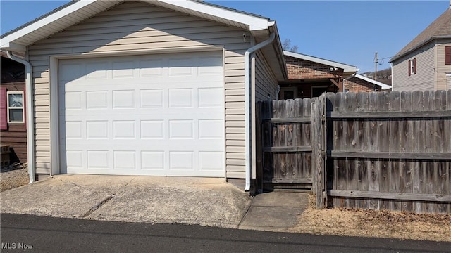 detached garage with fence