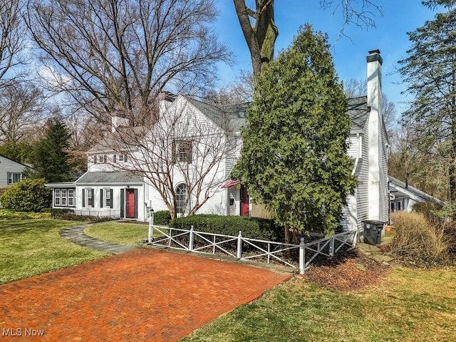 exterior space featuring a gate and fence