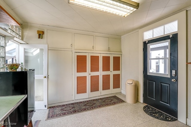 foyer with speckled floor