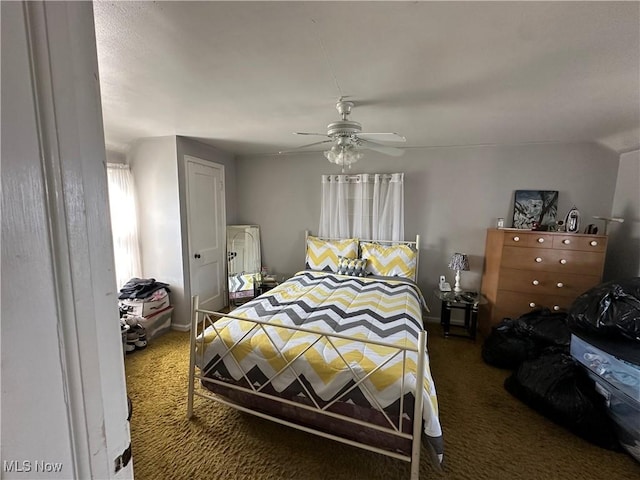 bedroom with carpet flooring and a ceiling fan