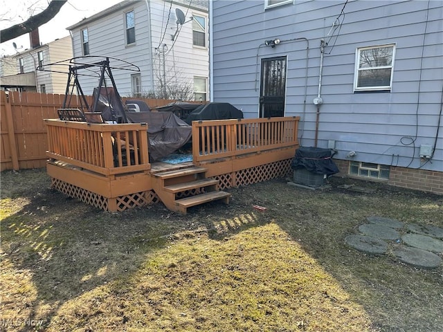 wooden deck featuring fence