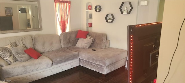 living room featuring dark wood-style flooring