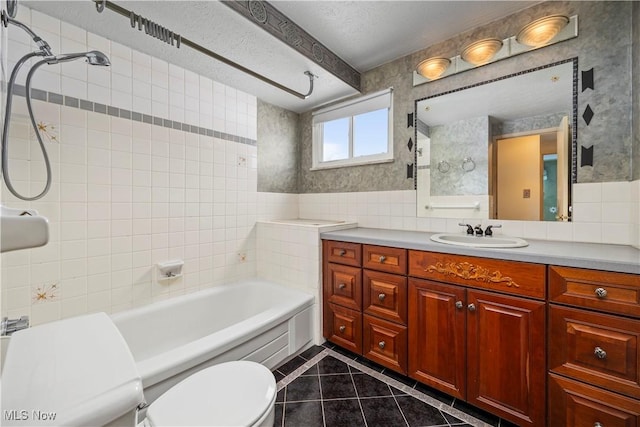 bathroom featuring toilet, a washtub, a textured ceiling, tile patterned flooring, and walk in shower